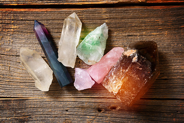 Crystals Rocks Minerals | Stone Mania six terminated crystals and a rough rose quartz stone