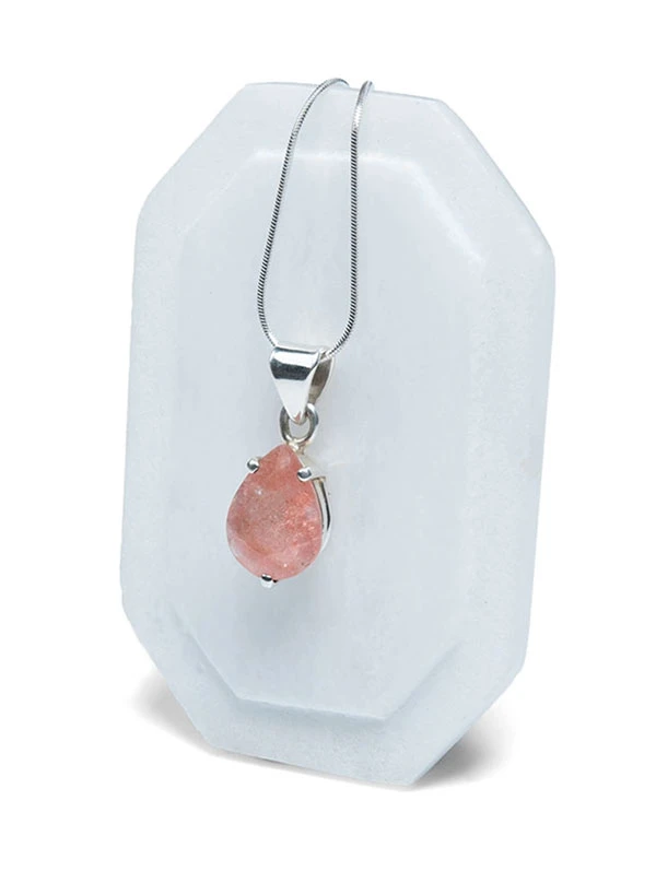 pear shaped strawberry quartz pendant hanging on a silver snake chain