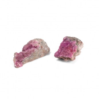 two cobaltoan calcite minerals with pink coloured crystals