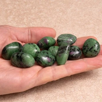 Ruby zoisite tumbled stones.